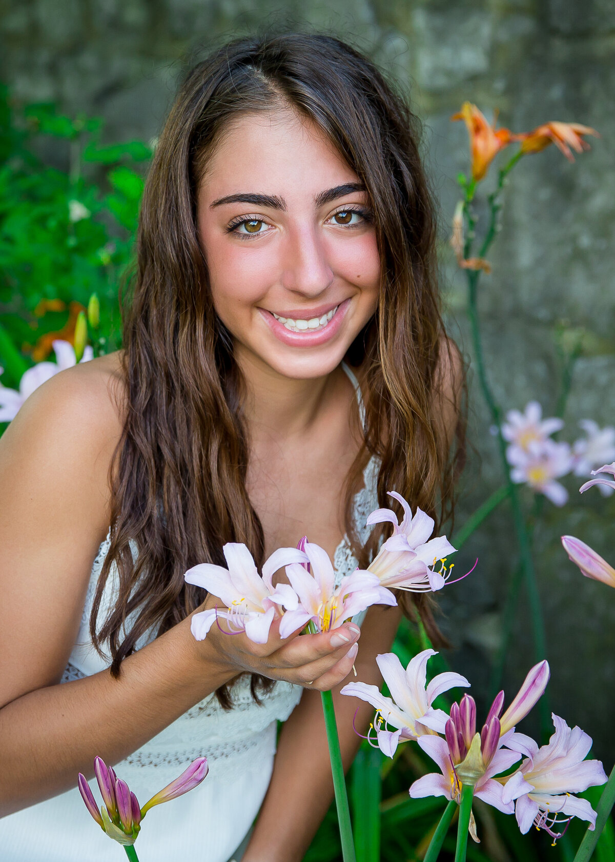 Senior pictures taken in flower gardens at Sonnenberg Garden in Canandaigua, NY