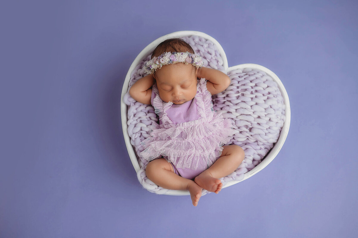 Infant posed for Newborn Portraits in Asheville, NC.