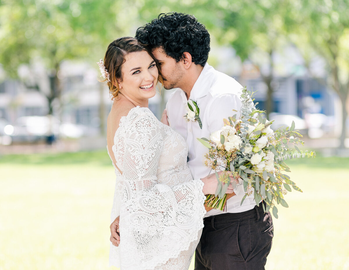 Bride and Groom after wedding in Tampa, FL in local park