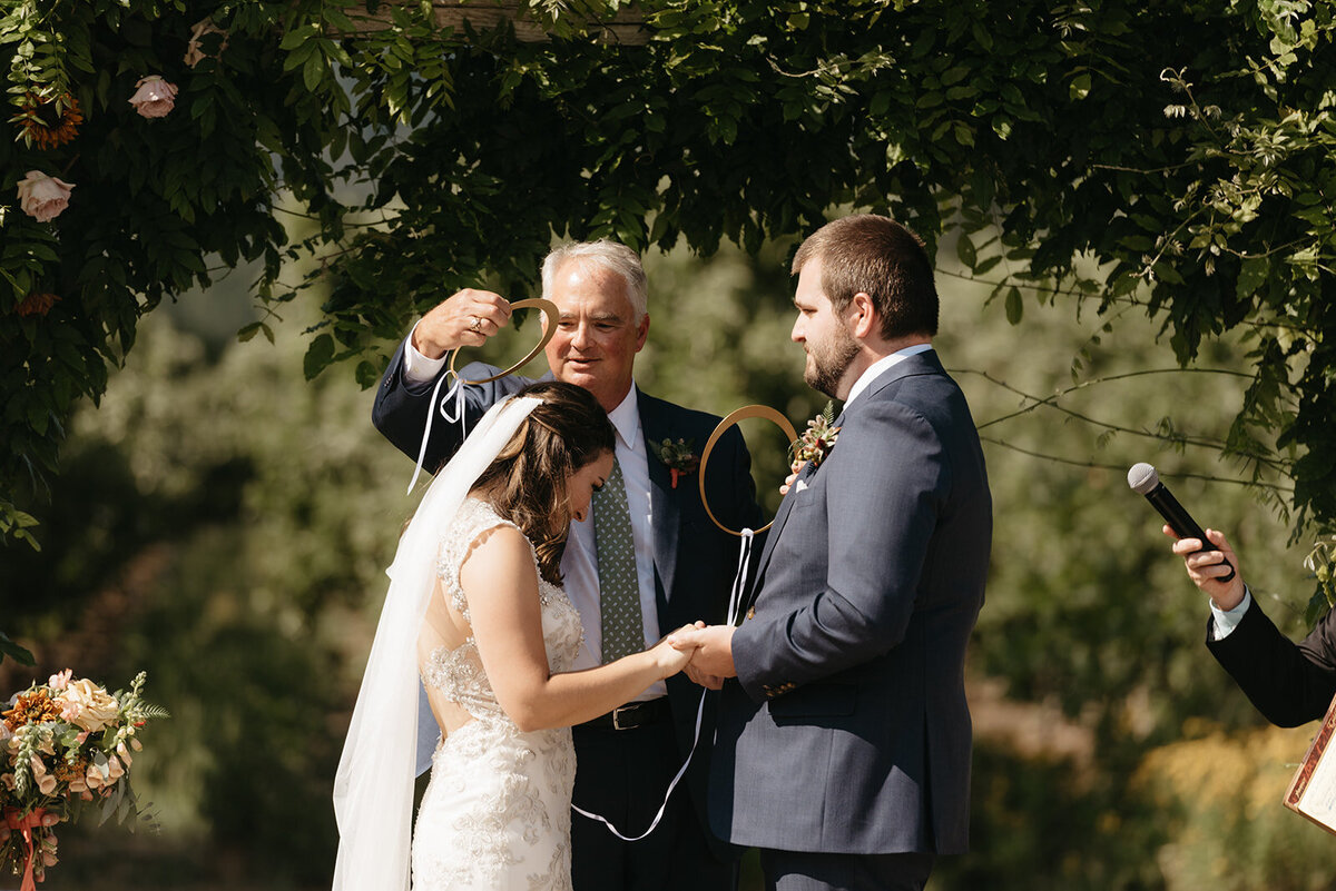 wedding ceremony at Tin Roof Barn