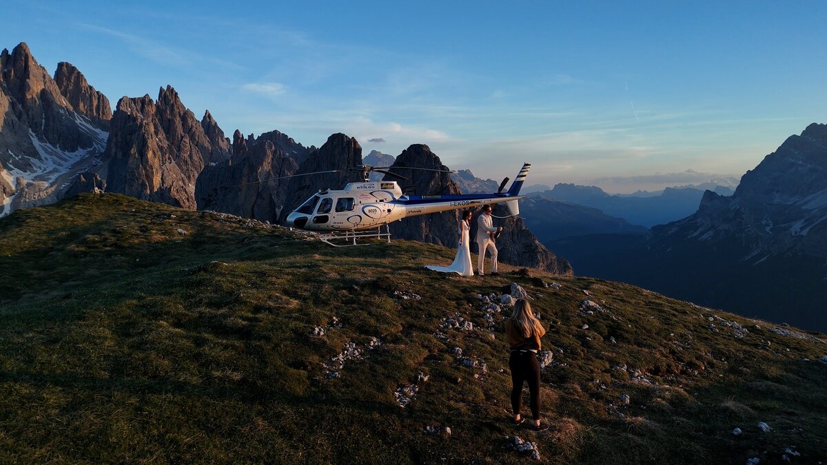 Couple on a boat eloping at Lago di Braies