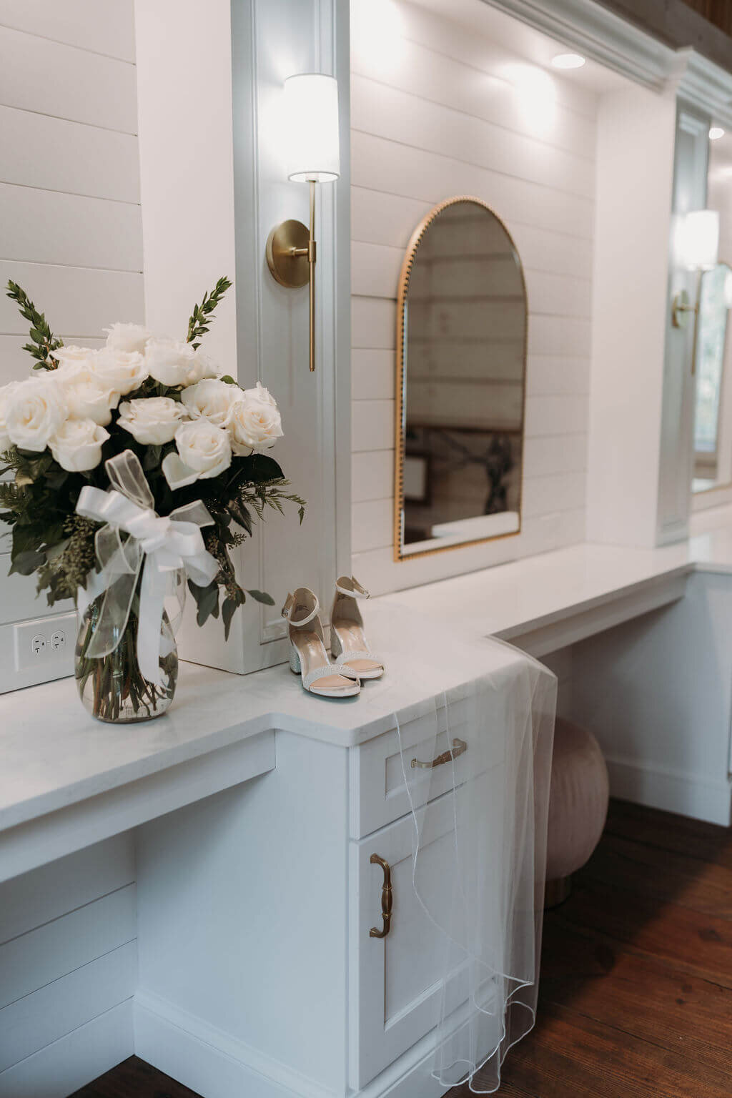 Mirrors and florals inside the bridal suite at koury farms