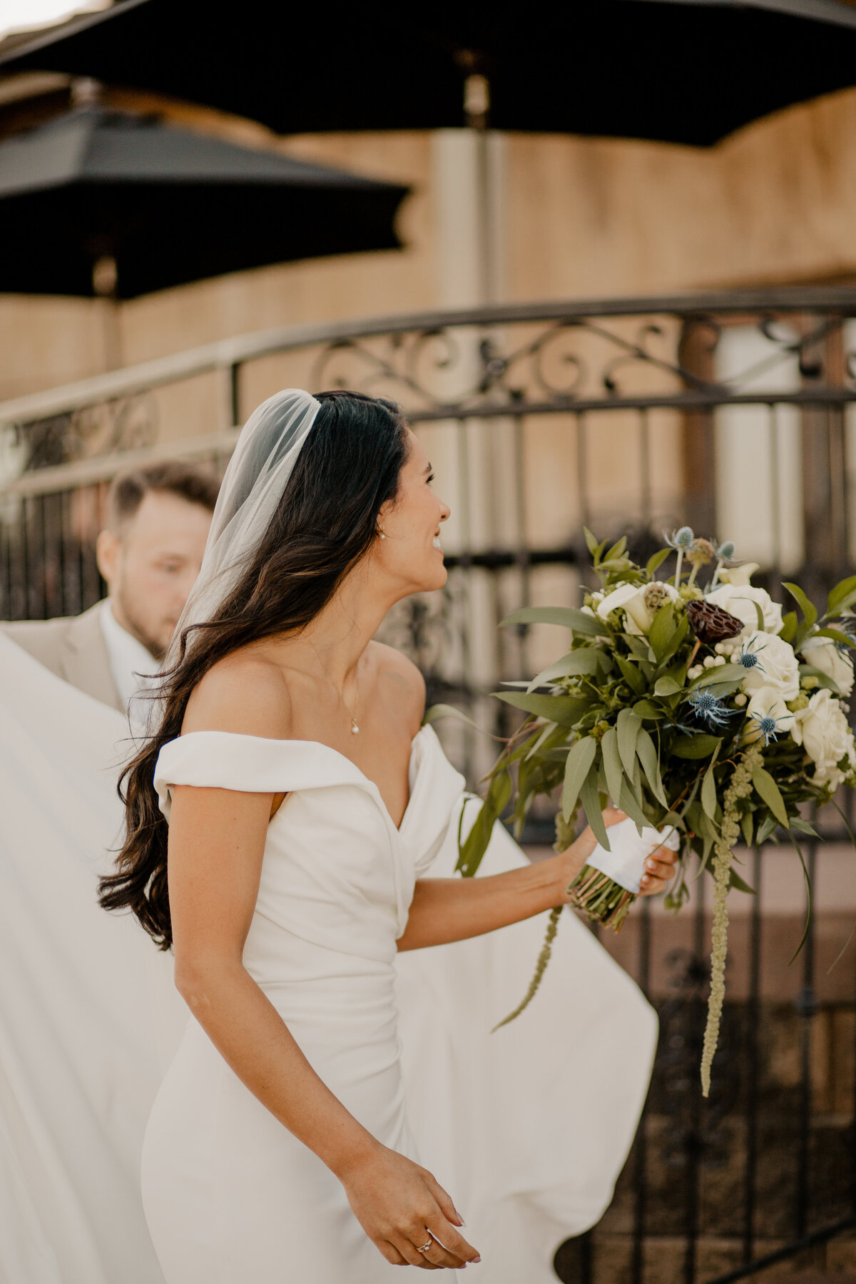 Elegant Bella Terre Vineyard wedding near Omaha, NE, blending luxury and rustic charm. Bride and groom celebrate amidst picturesque vineyard views and timeless architecture, captured by Tori Nichole Photography. A stunning setting for couples seeking a unique and sophisticated venue in the Omaha and Iowa region.