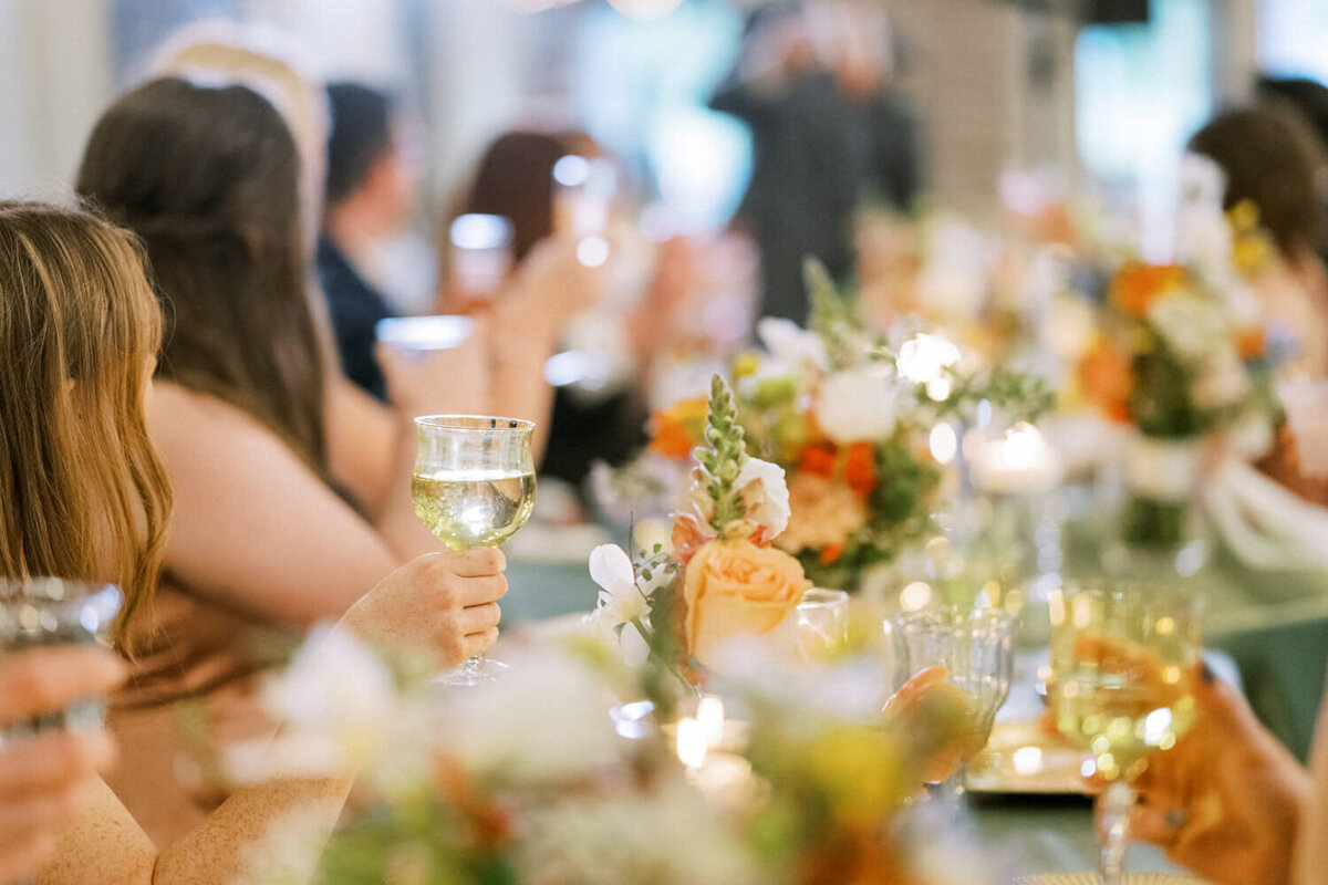 guests-holding-colorful-goblet