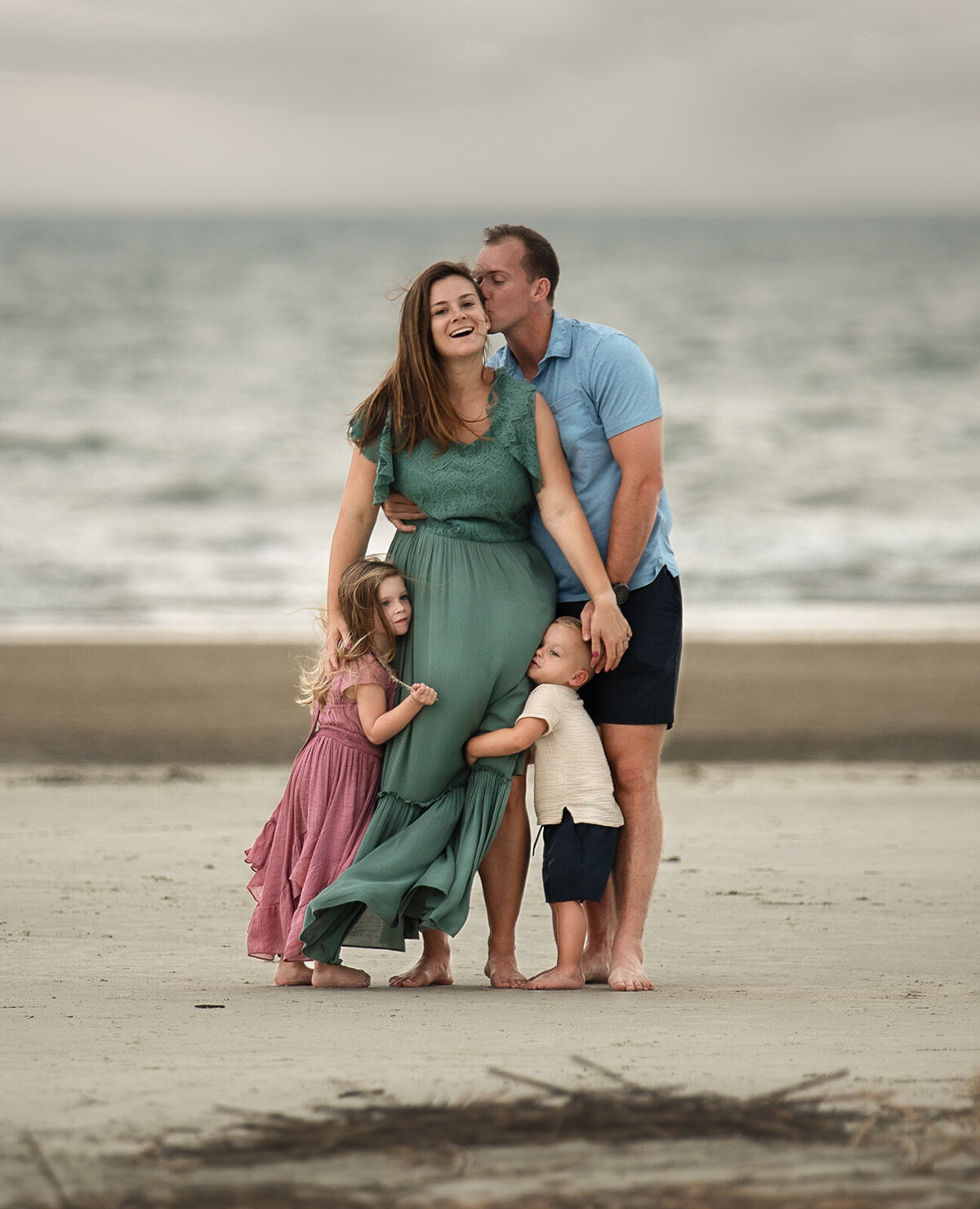 family on a beach by st. louis family photographer