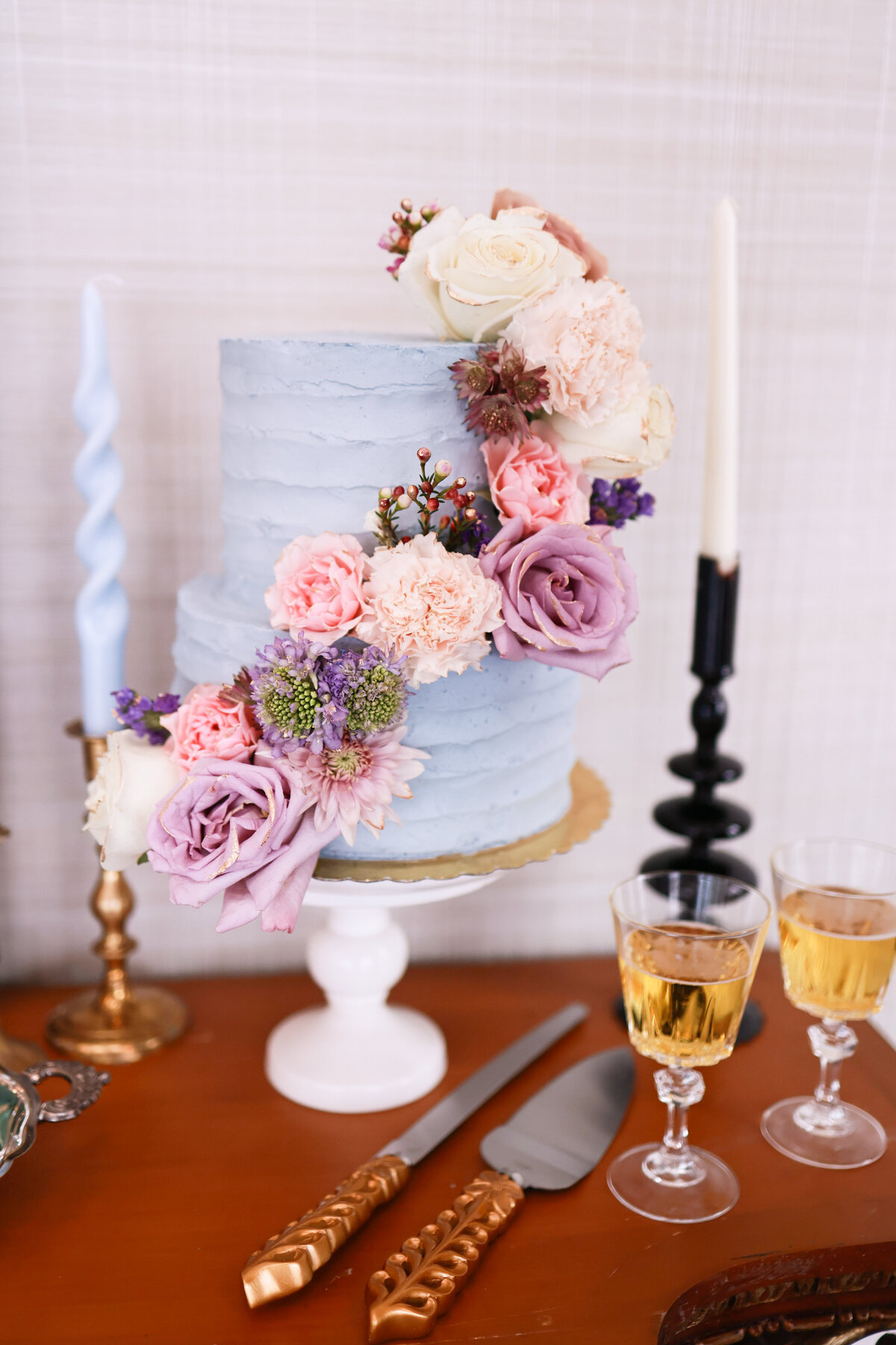 colorful and floral wedding cake with champagne in Atlanta Georgia by Atlanta Georgia wedding photographer Amanda Richardson Photography