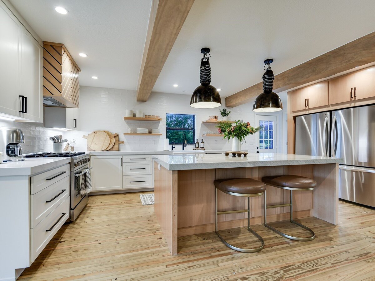 Kitchen with kitchen island and wooden and brass details