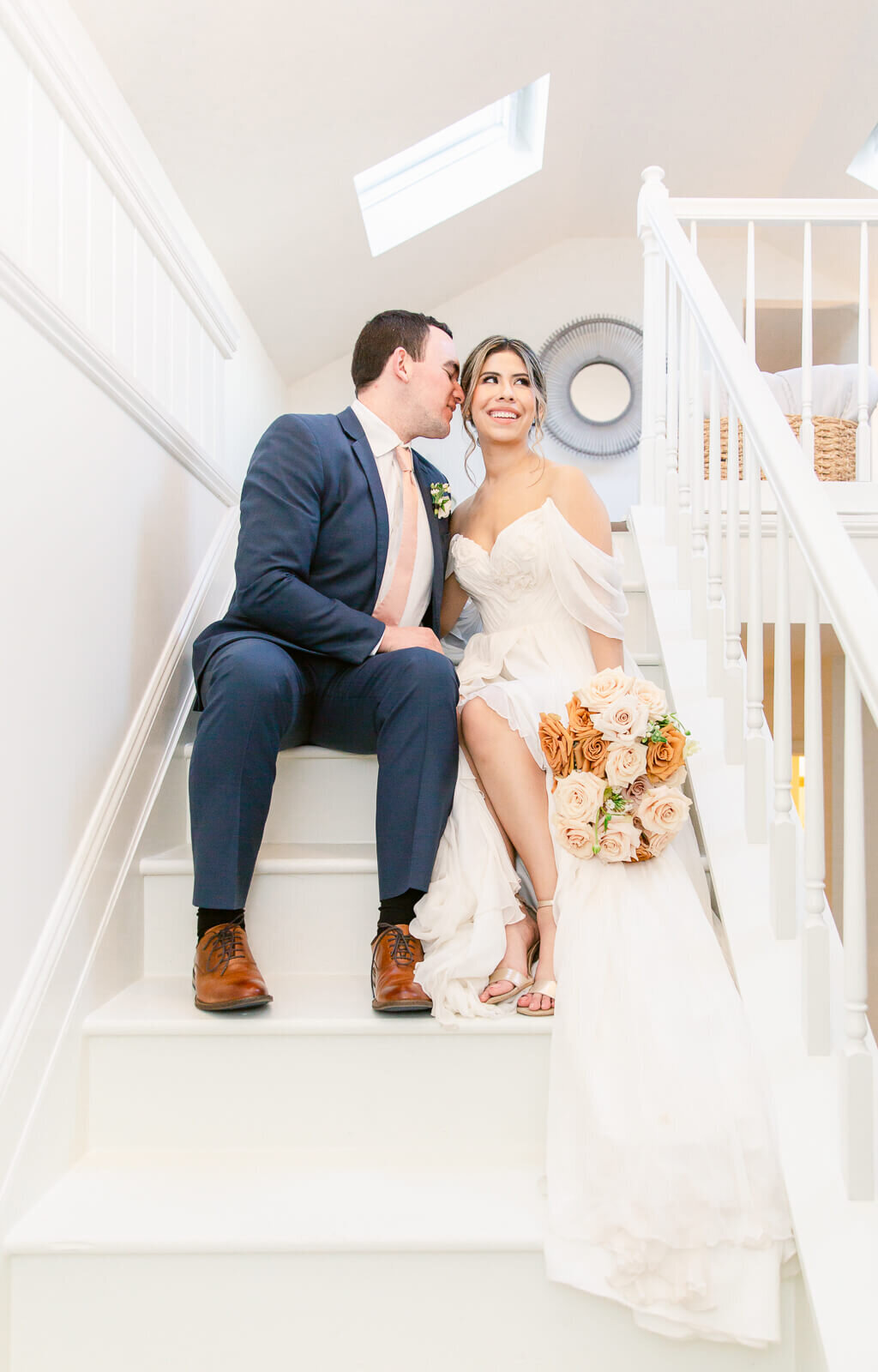 Bride and Groom take portraits sitting on the staircase at Hemlock Hospitality in Loudon County, Virginia. Taken by Bethany Aubre Photography.