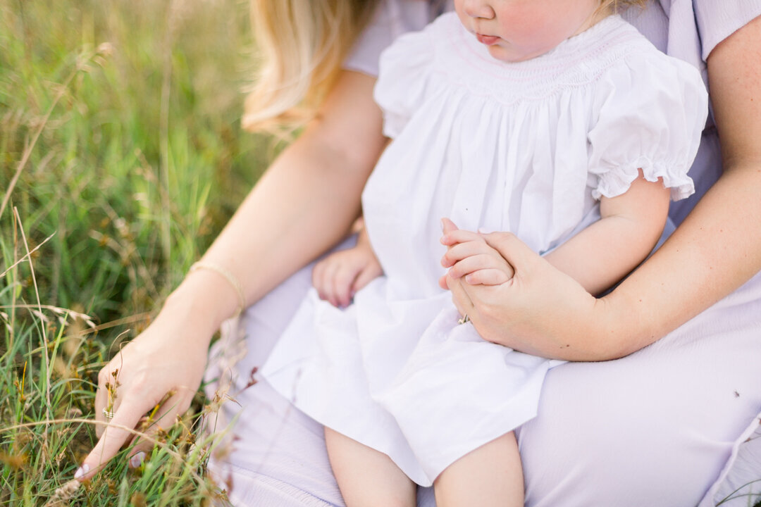 Mama holding baby's hand