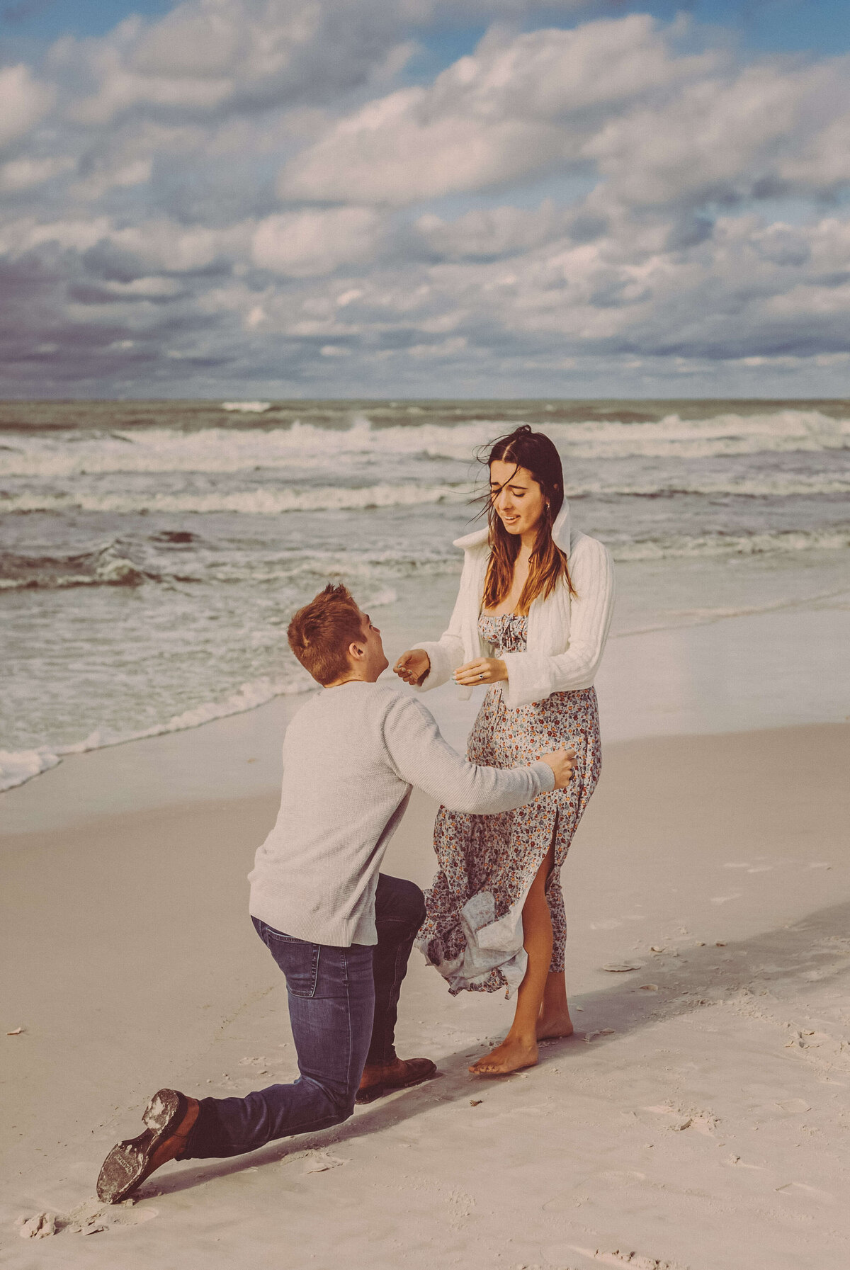 ashley reaches for ben emotionally after he proposes on panama city beach