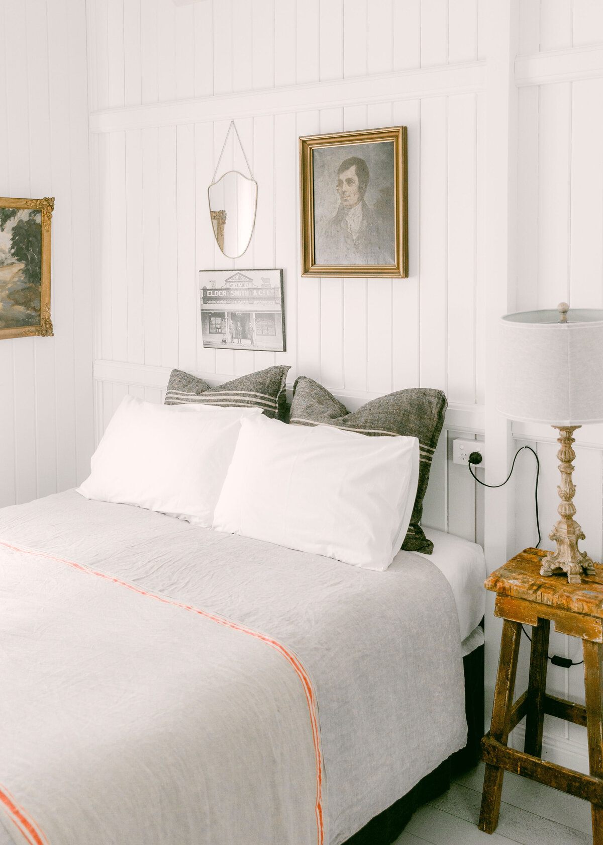 shiplap modern meets vintage Airbnb with contrasting accents