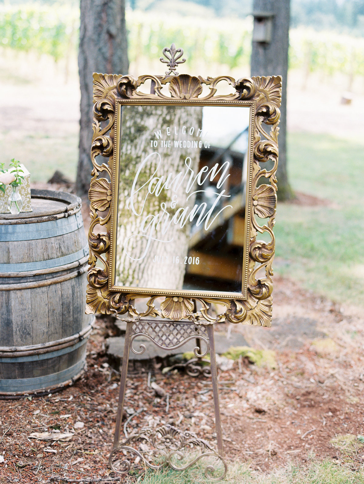 hand lettered welcome sign at a wedding