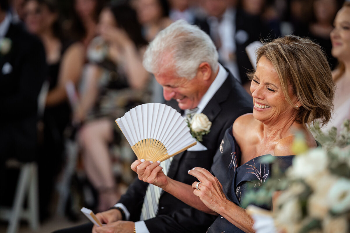 laughs by parents at the ceremony