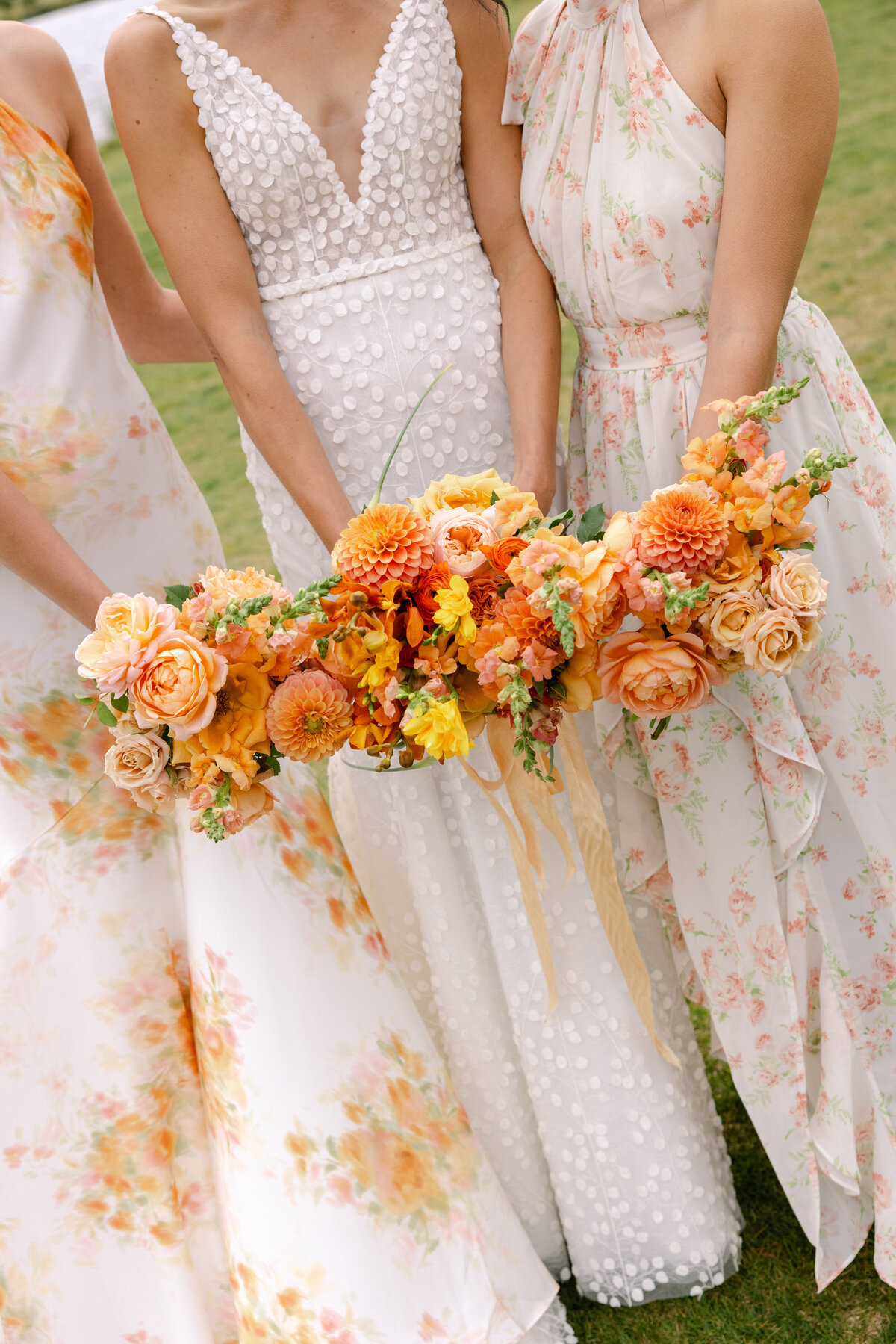 Multicolored and patterned bridesmaid dresses with vibrant bouquets representing full service calligraphy and design by Life in Letters