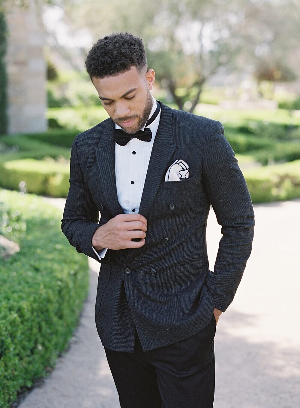 groom in double breasted suit at cal-a-vie wedding  | Jacqueline Benét