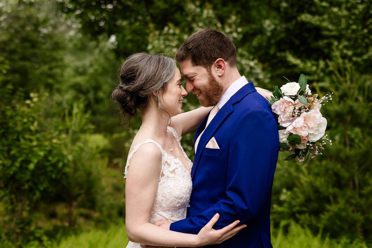 Bride and groom looking longingly into each other eyes