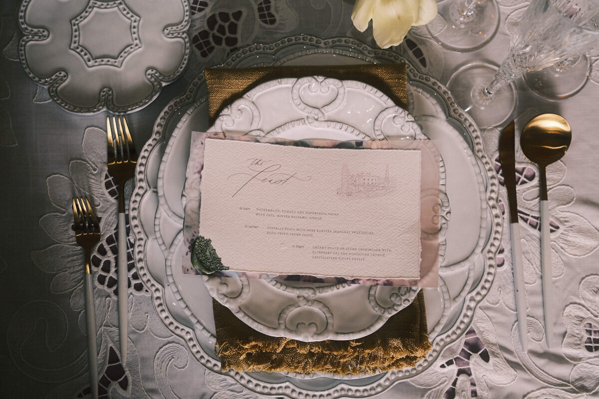 A wedding photo of the dinner menu at Villa Aura delLago on Lake Como