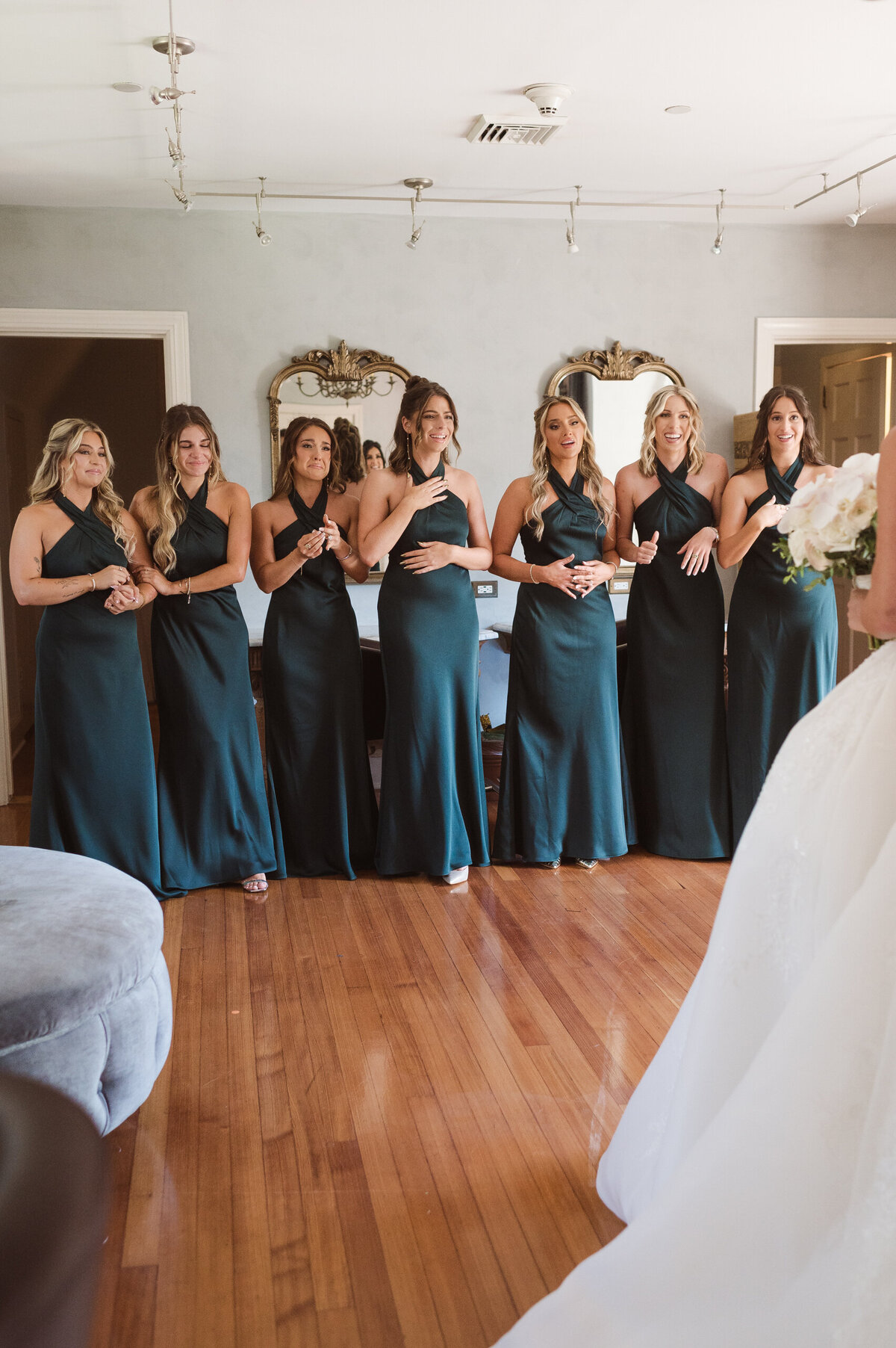 bridesmaids wearing blue teal