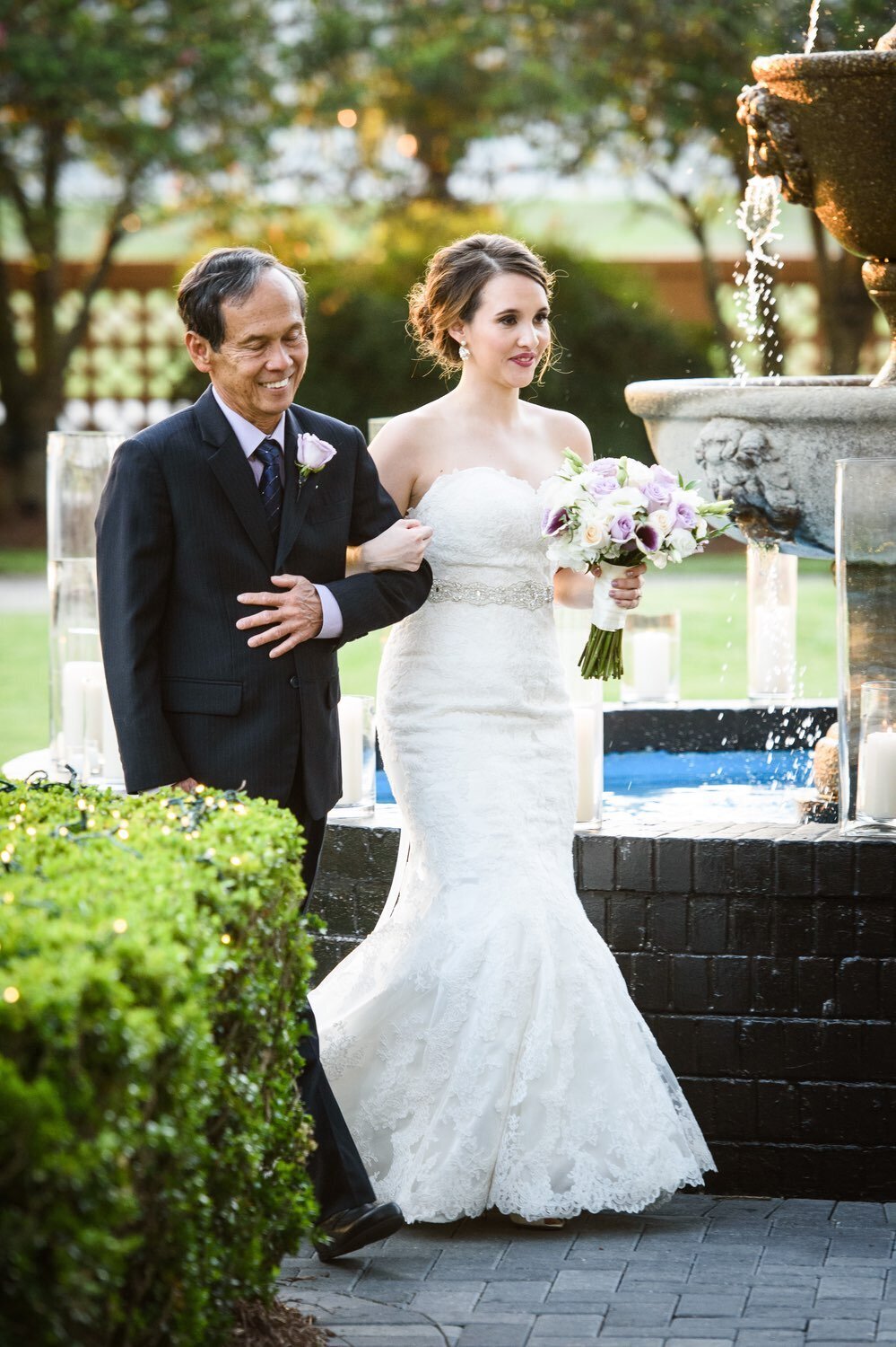 Bride and father walking down the aisle