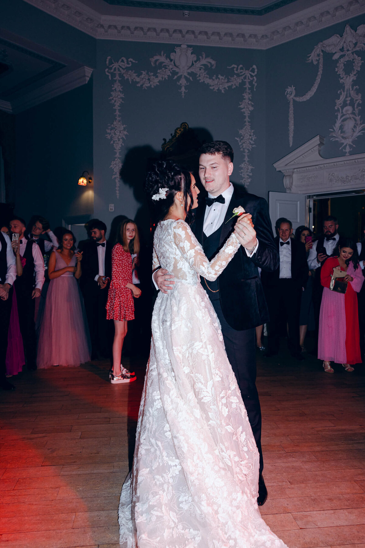 A wedding photo of the bride and groom during their first dance at Luttrellstown Castle