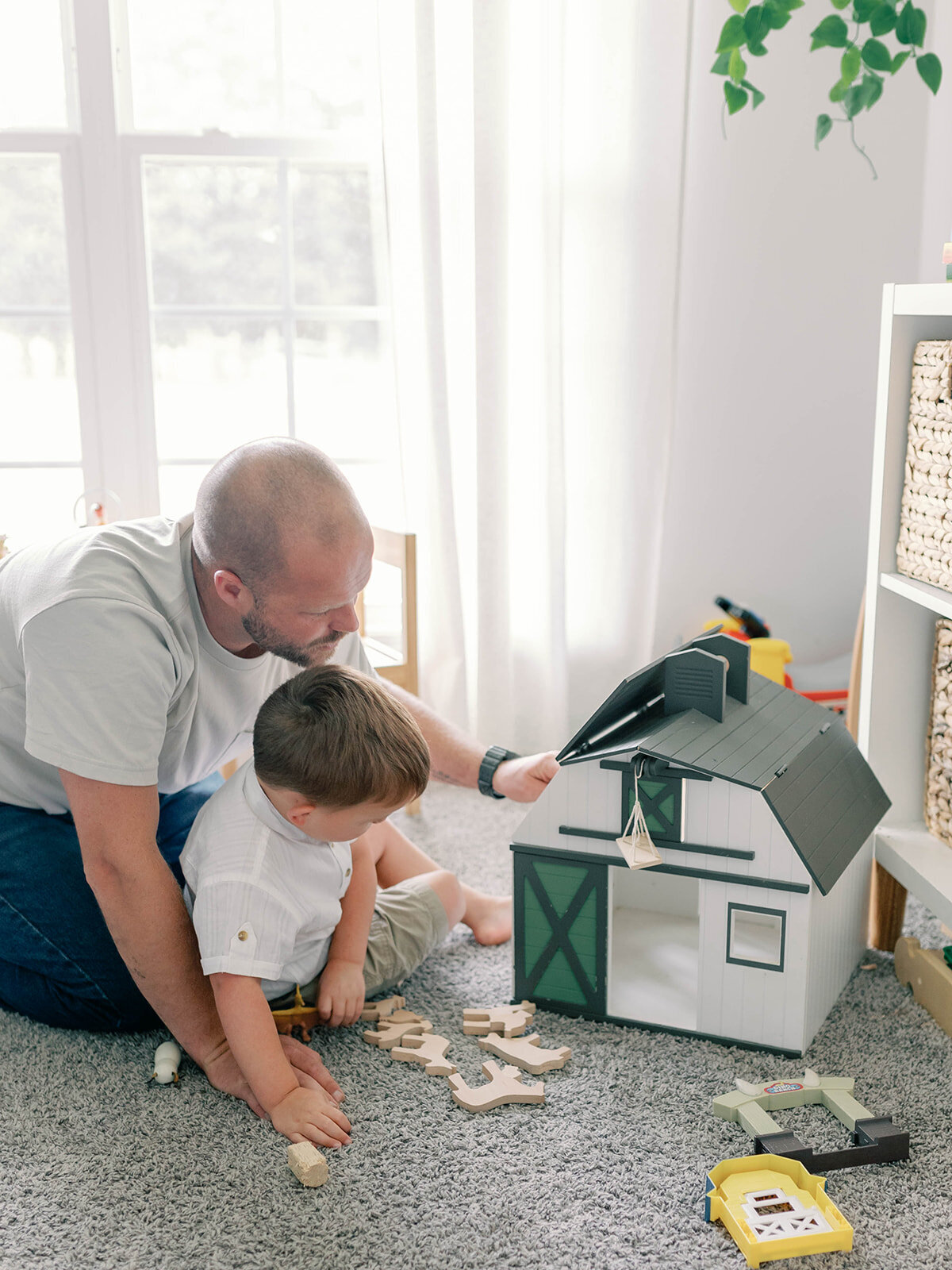 Dad and son playing on the floor