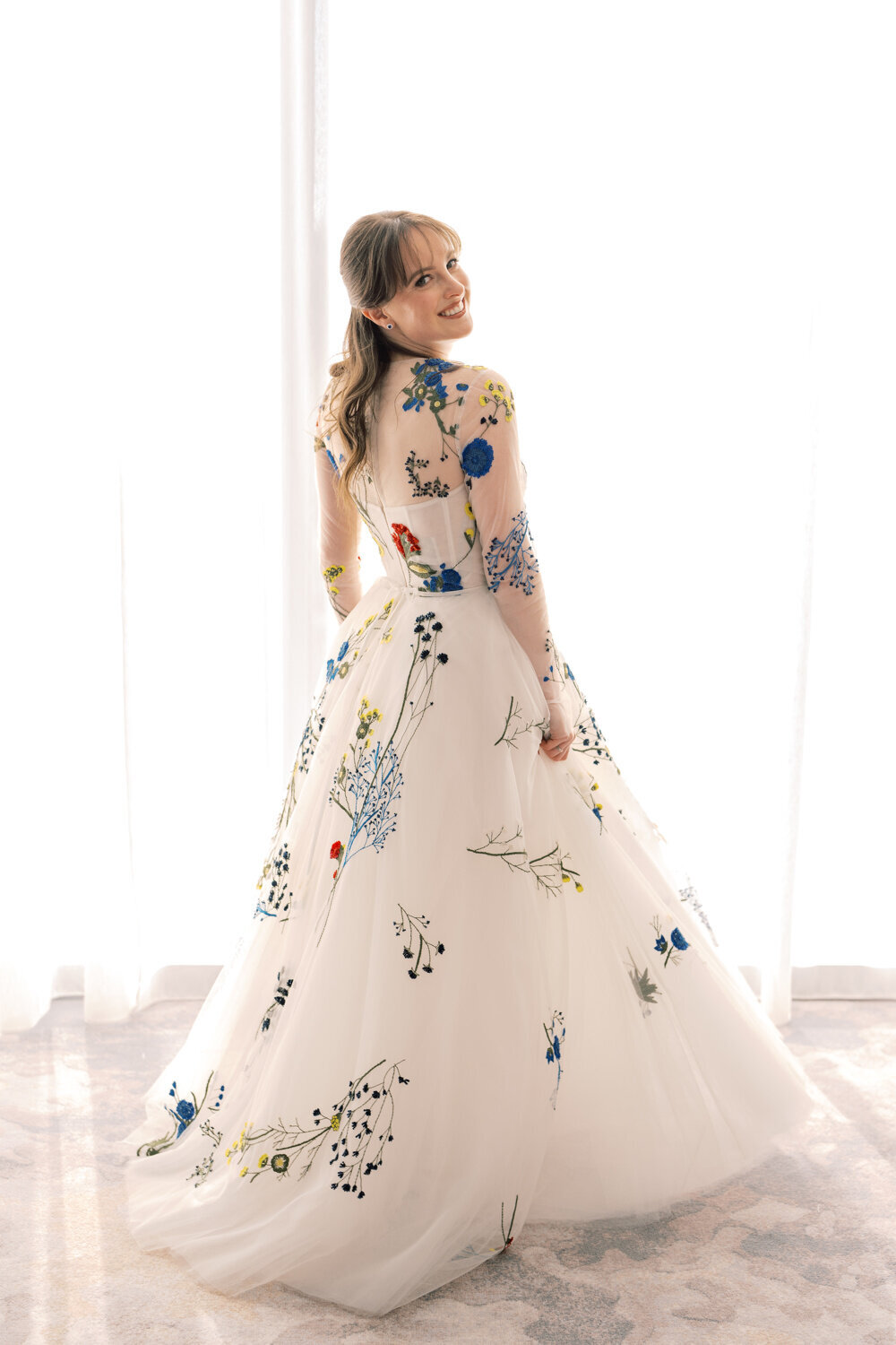 Monique Lhuillier floral wedding dress and veil