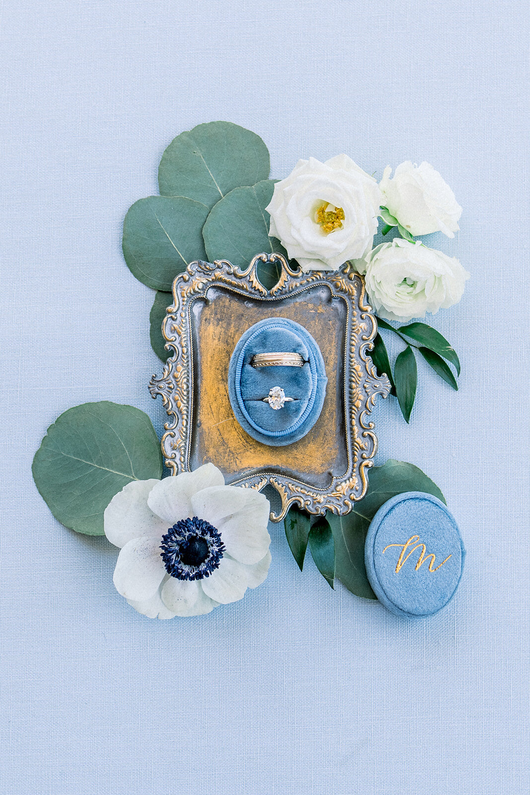 Dusty blue wedding ring flatly at Dolphin Bay Resort in Pismo Beach, CA