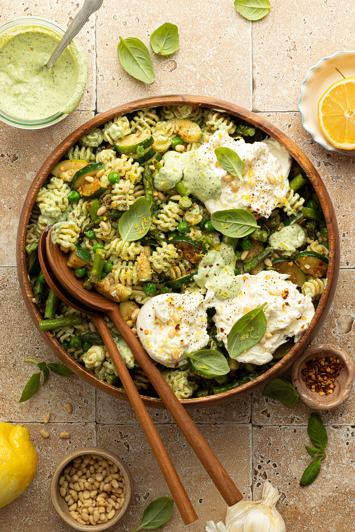a bowl of pasta salad with plenty of greens