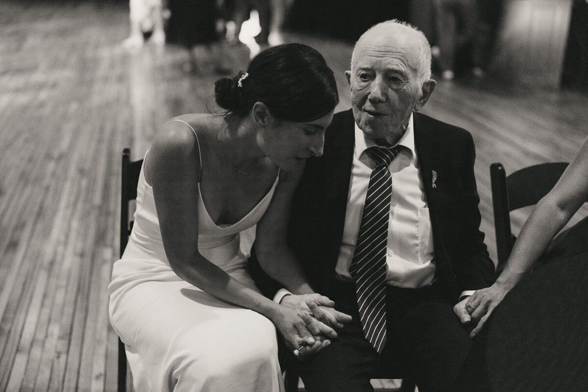 Black and white photo of the bride with her Dad