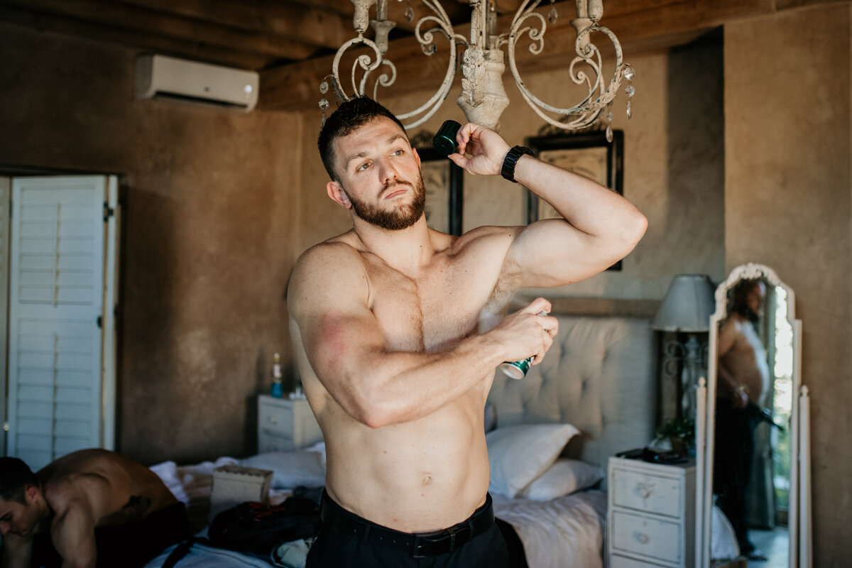Fit groom preps by putting on underarm spray while getting ready. 