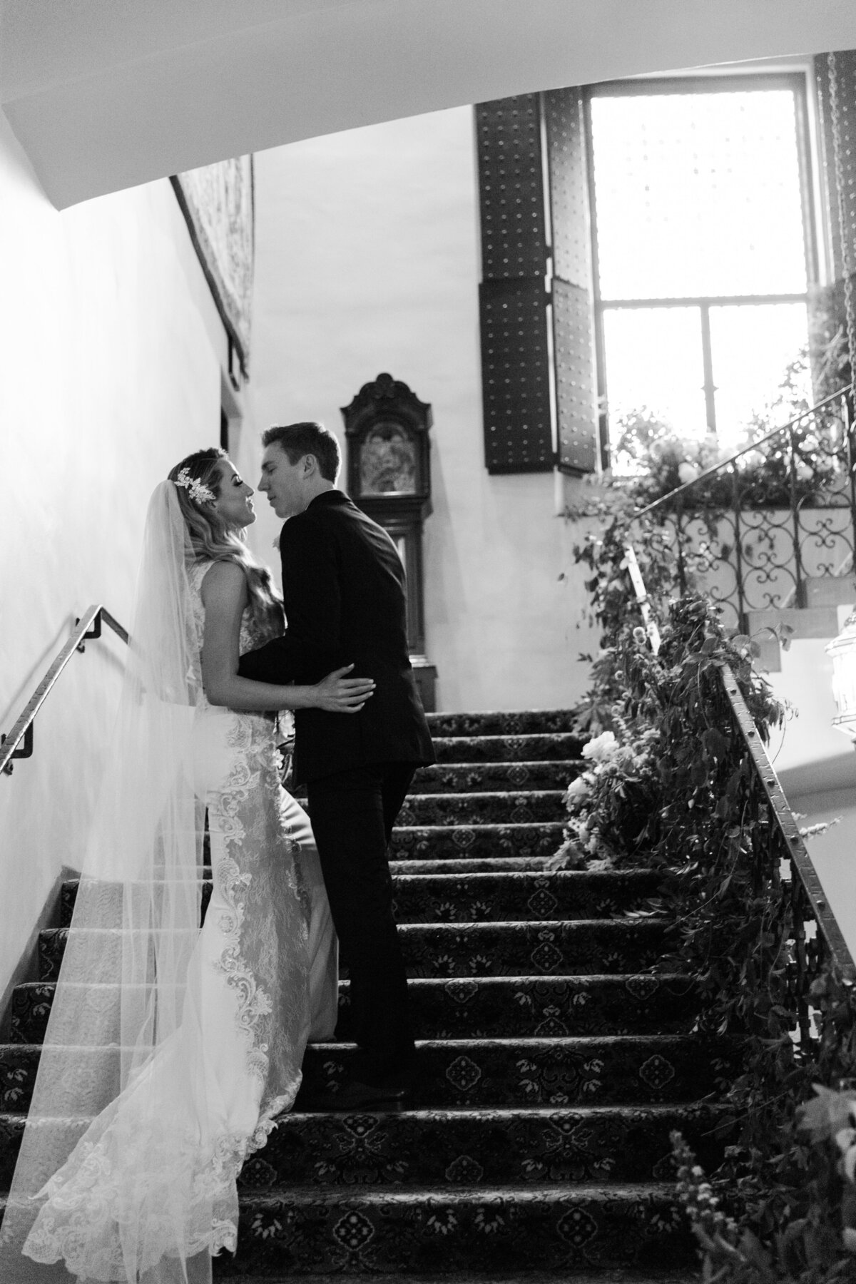 bride and groom on stairs