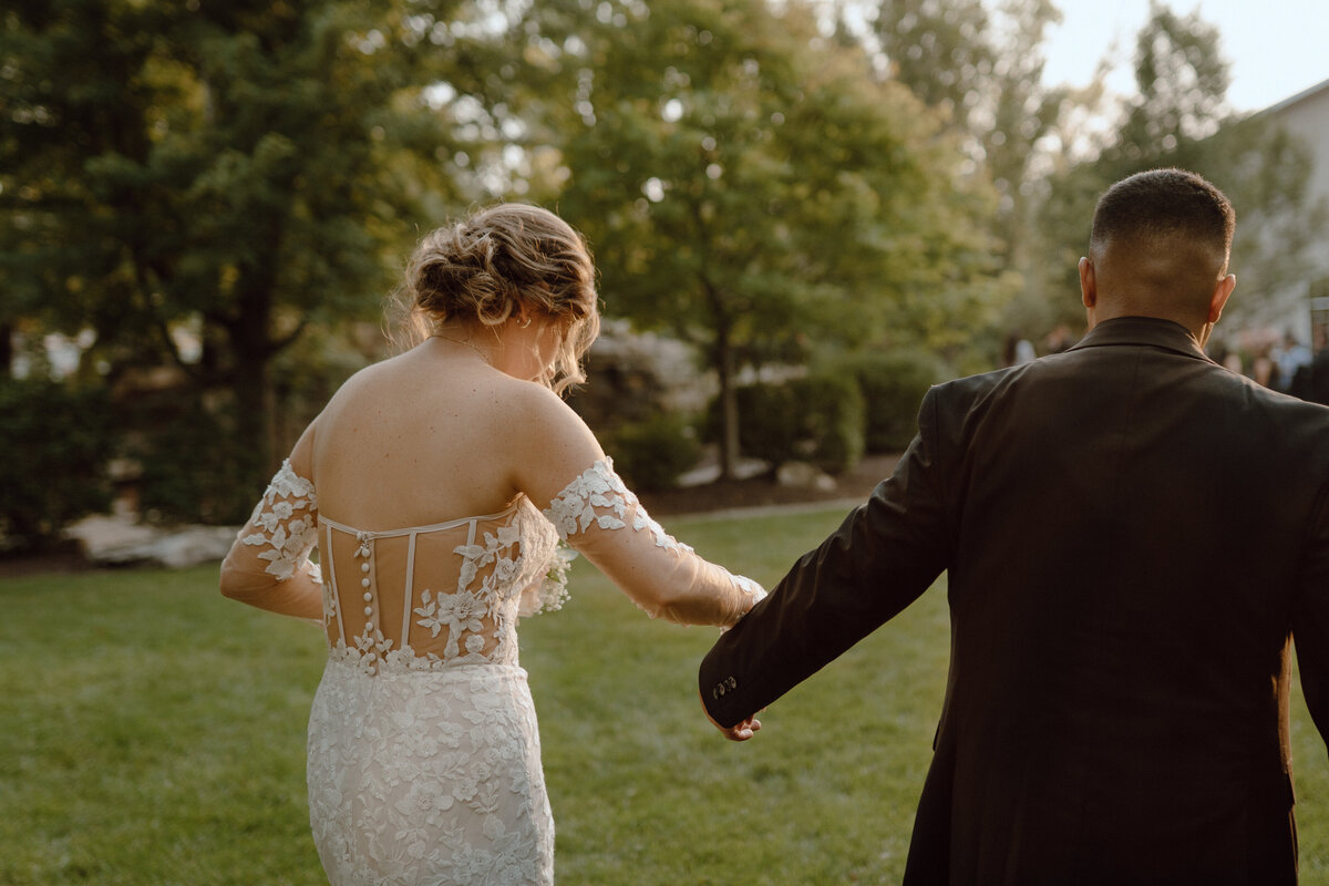 couple-walking-away-together-des-moines-wedding-photographer-storyteller-collective-photo-co