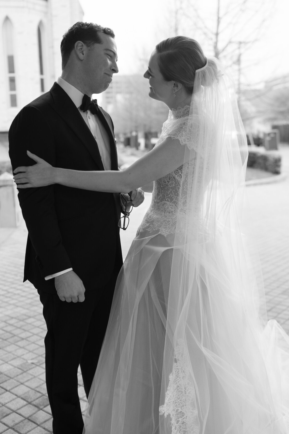Black and white image of a bride and groom before their wedding ceremony in Dallas
