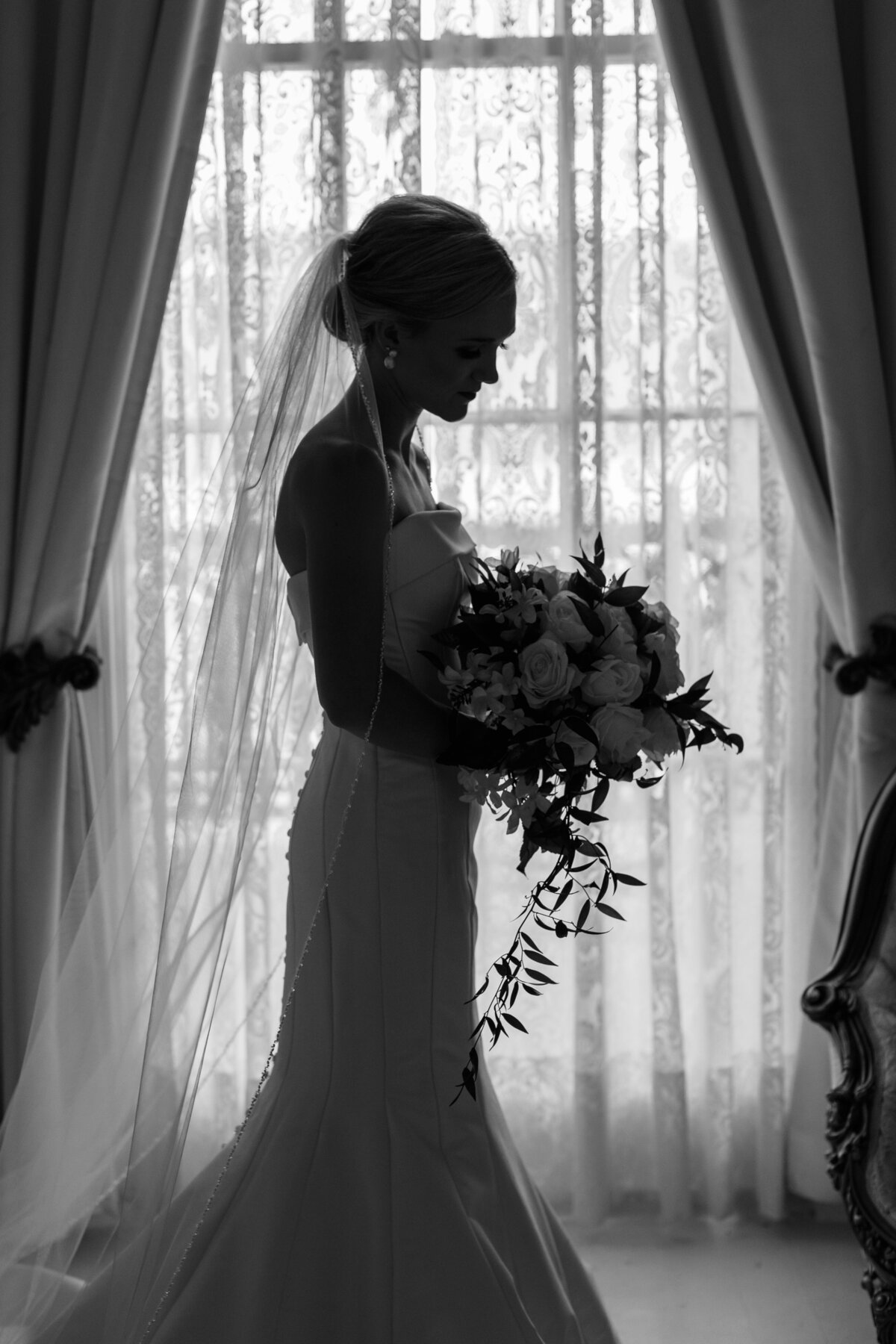 The silhouette captures the elegance of the bride.