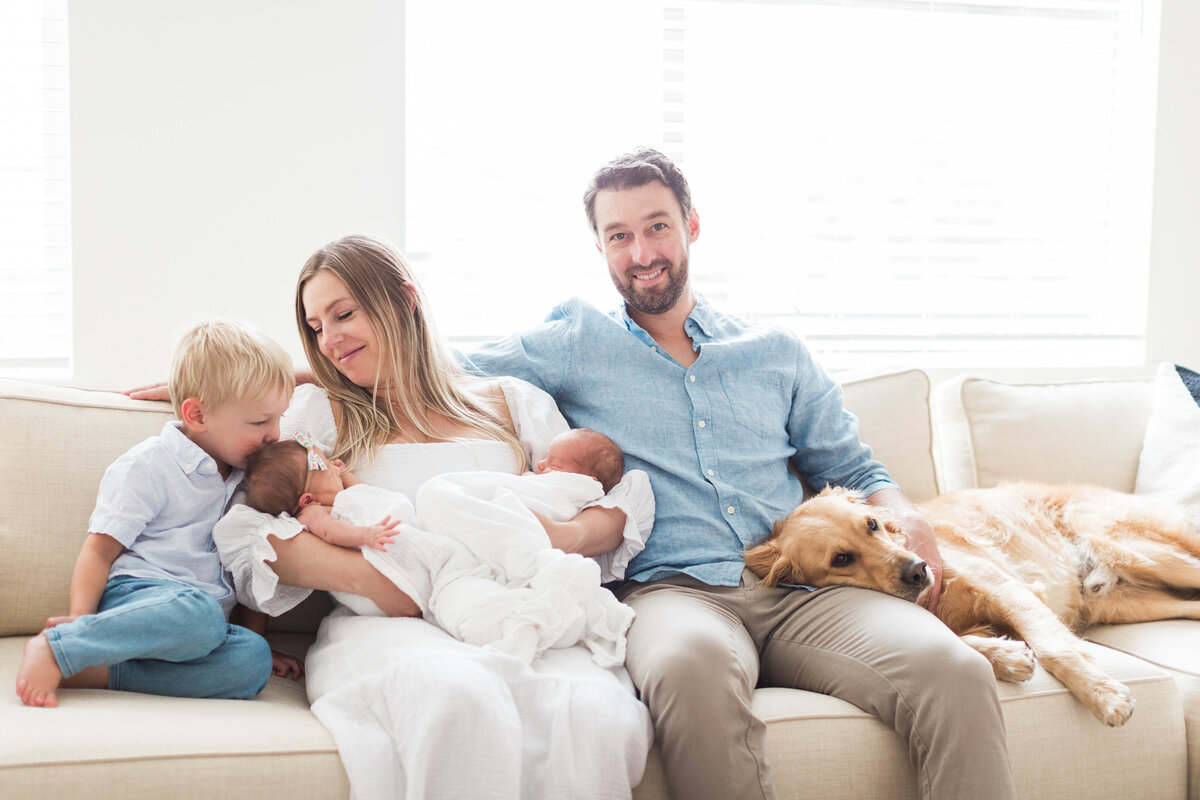 Family at home during newborn session in Denver