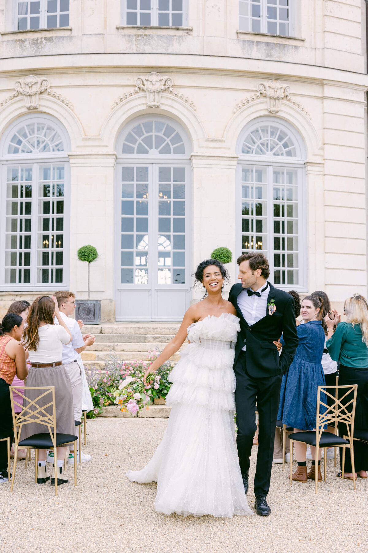A wedding photo of the ceremony at Chateau Du Grand Luce in France.