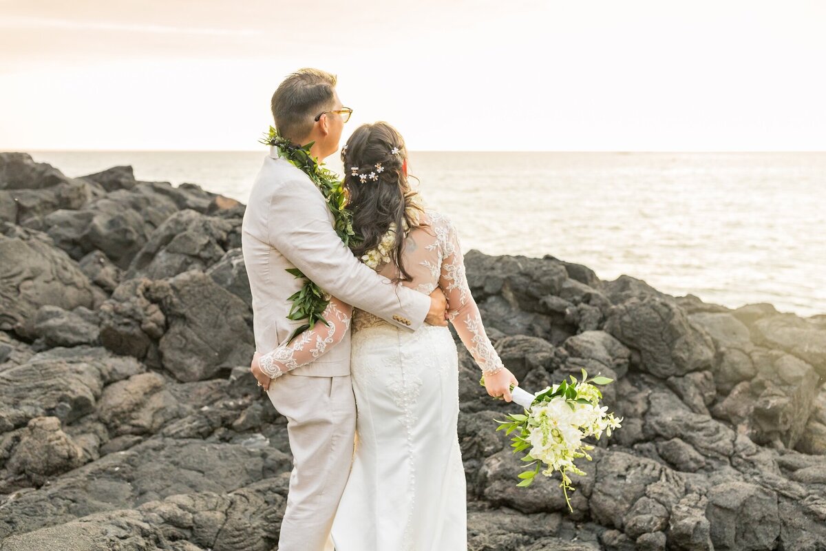 Big Island wedding photographers document sunset romance