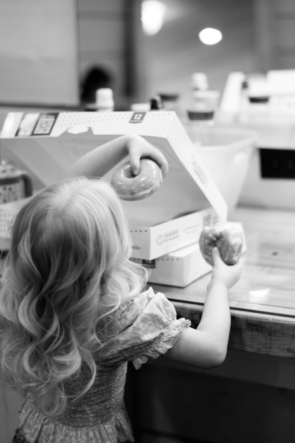 Flower girl grabs a donut