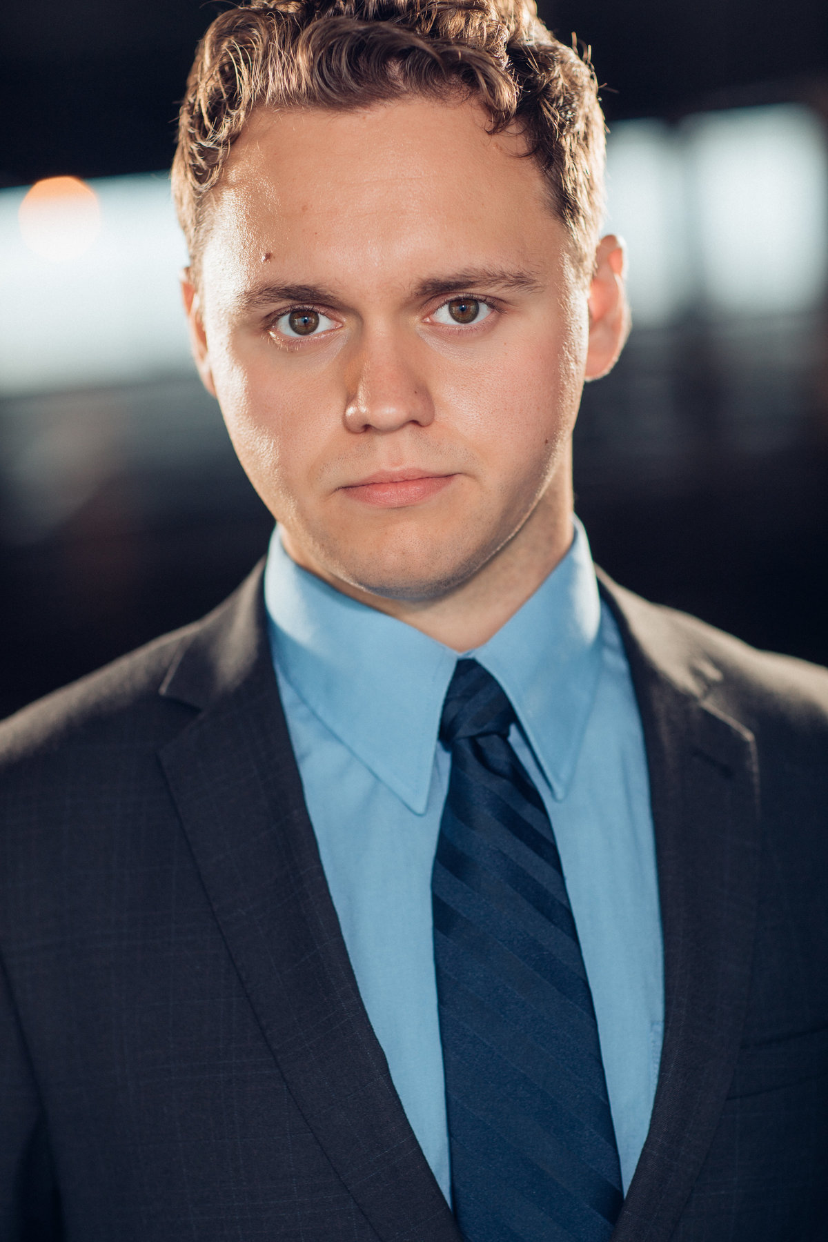 Young Man Wearing Blue Tuxedo with Sky Blue Long Sleeve Inner and Necktie Headshot in LA
