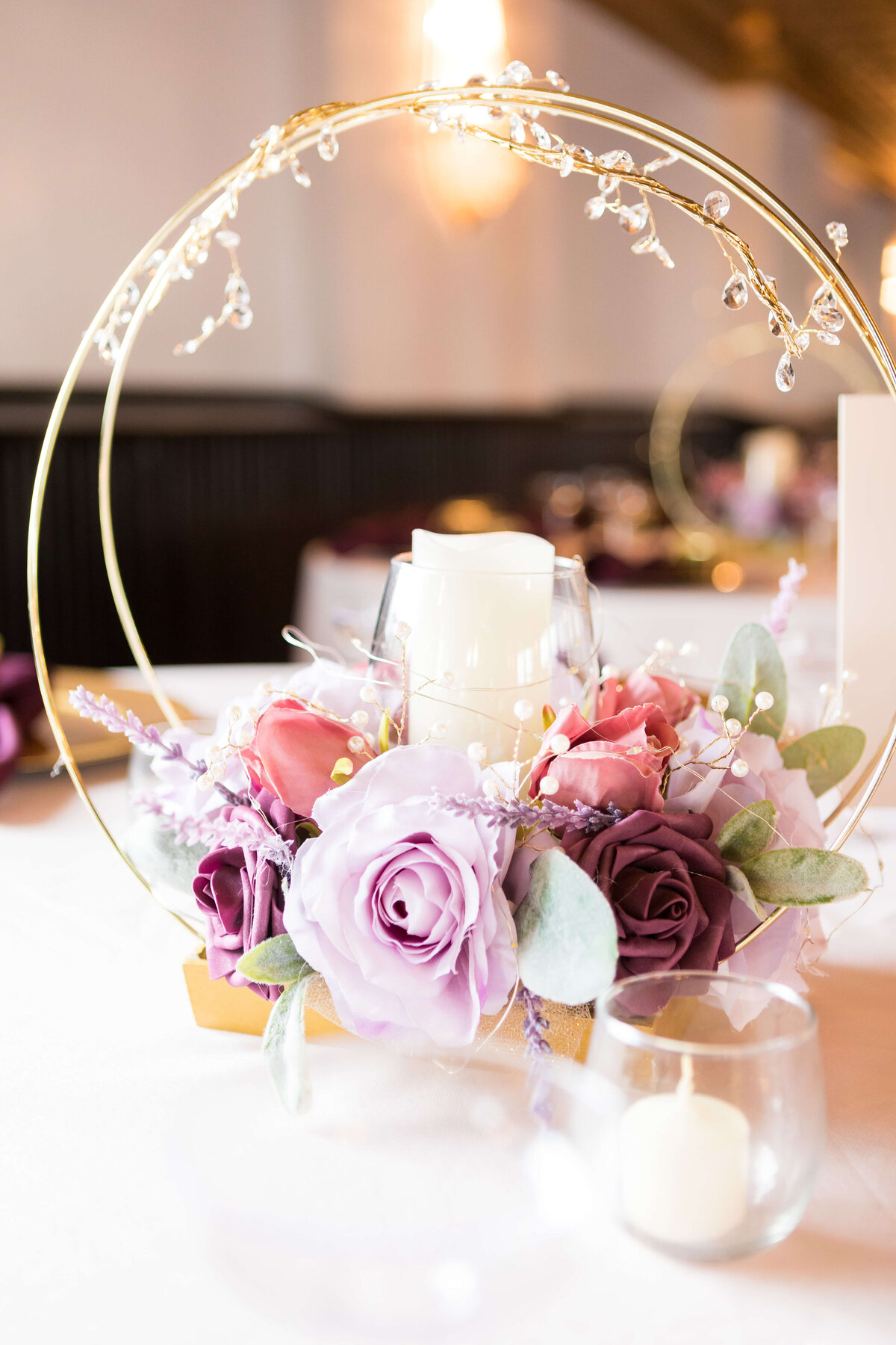 Florals with candles at  The Gatsby in Shelbyville,KY