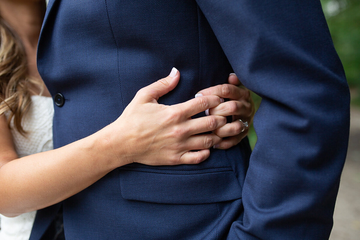 wedding-photography-hugging-bride-groom-rings
