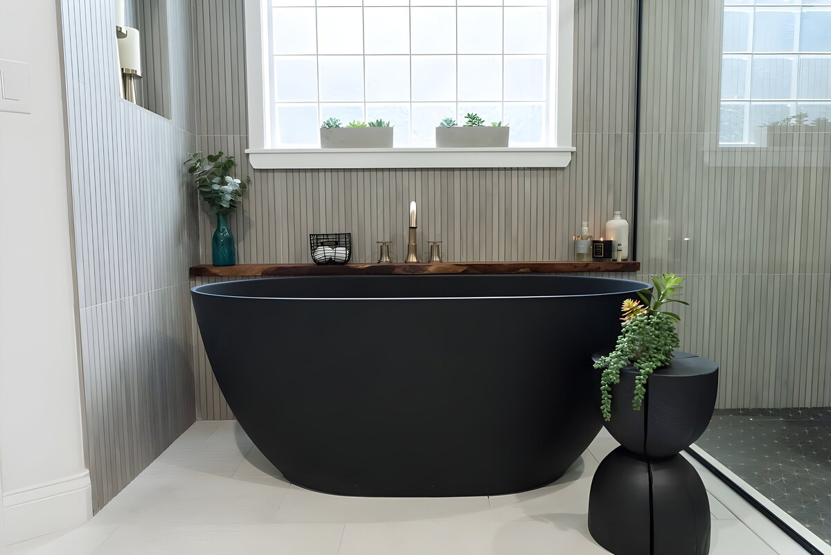 dewine design interiors hotel lux bathroom with black standing tub