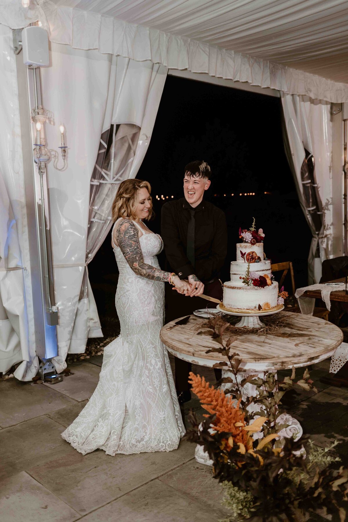 Married cutting cake.