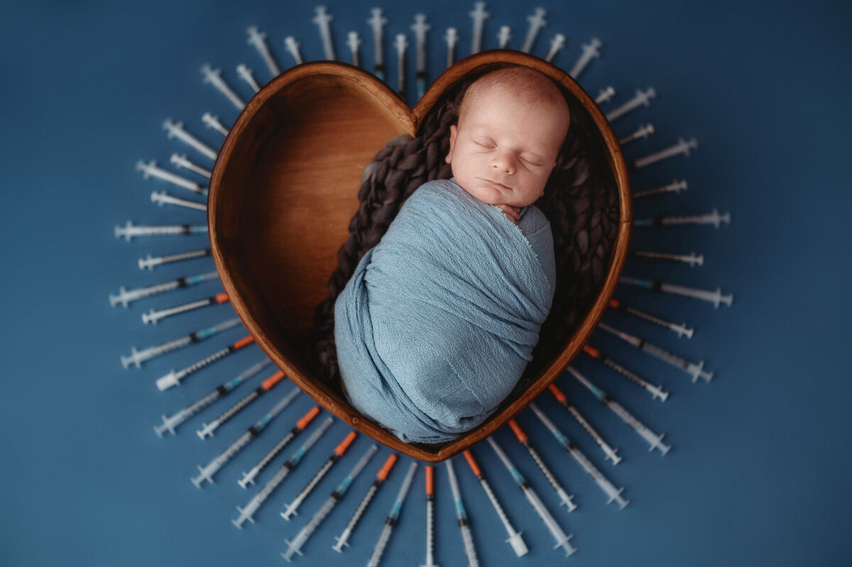 Baby posed for Newborn Photos in Asheville, NC.