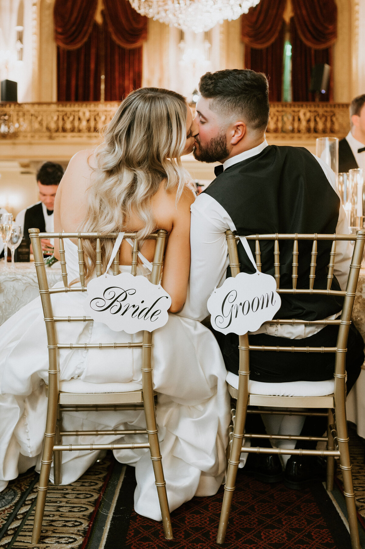 bride and groom kissing at wedding reception omni william penn hotel grand ballroom