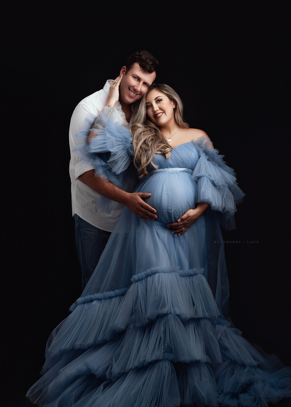 Couples maternity photo in Syracuse Studio