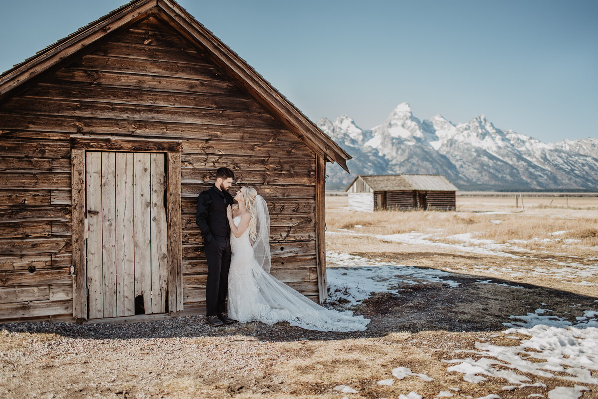 Jackson Hole Photographers capture couple embracing during bridal portraits