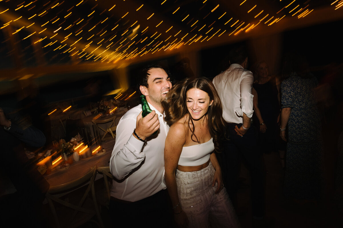 Two people dancing at a wedding