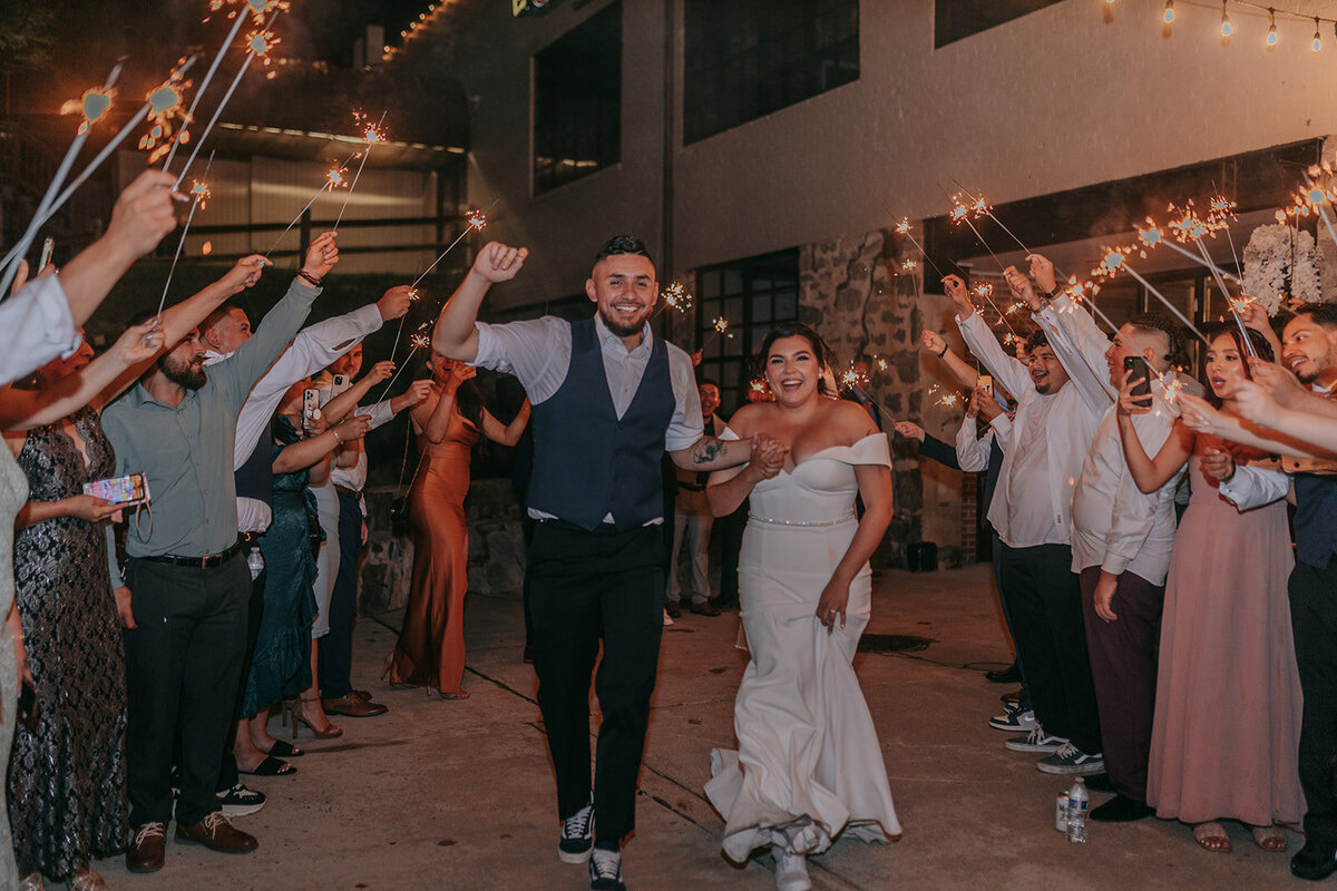Bride and groom sparkly wedding exit