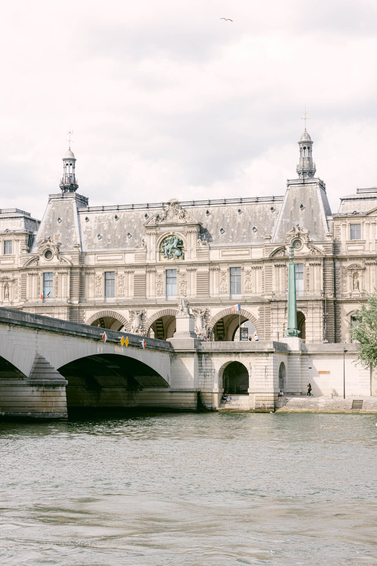 A wedding photo showing off the architecture of Paris